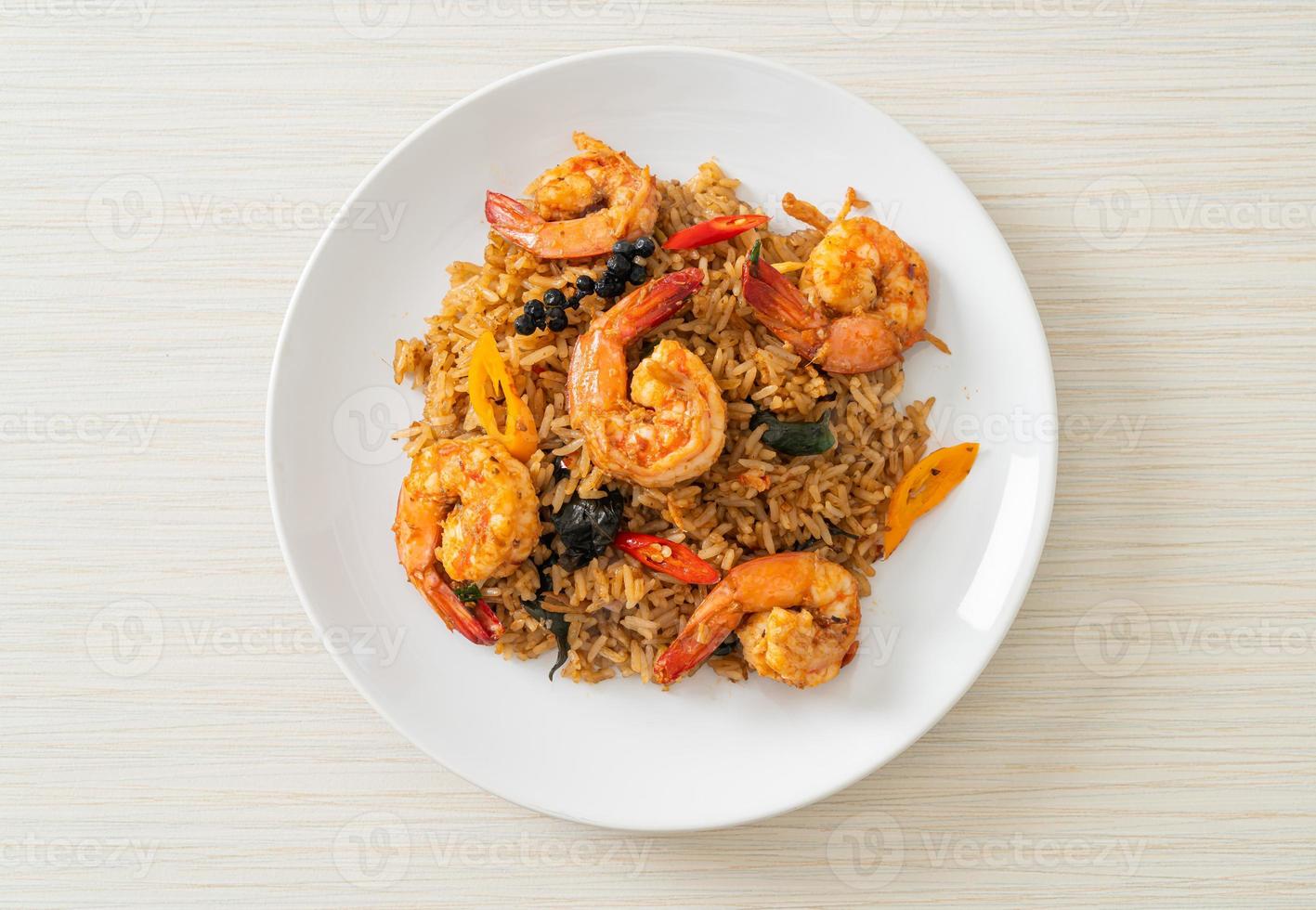 shrimps fried rice with herbs and spices photo