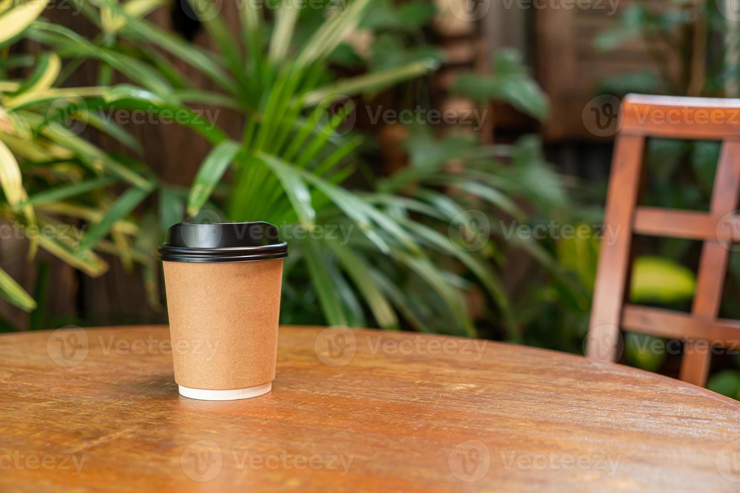 hot coffee cup on wood table photo