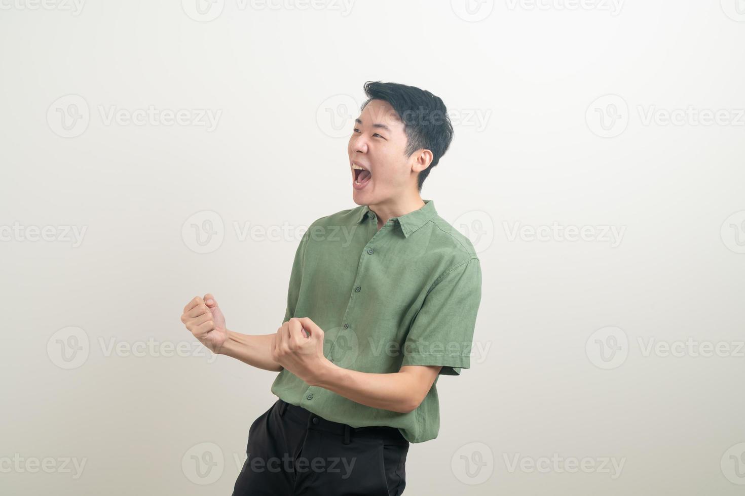 young Asian man with successful action photo