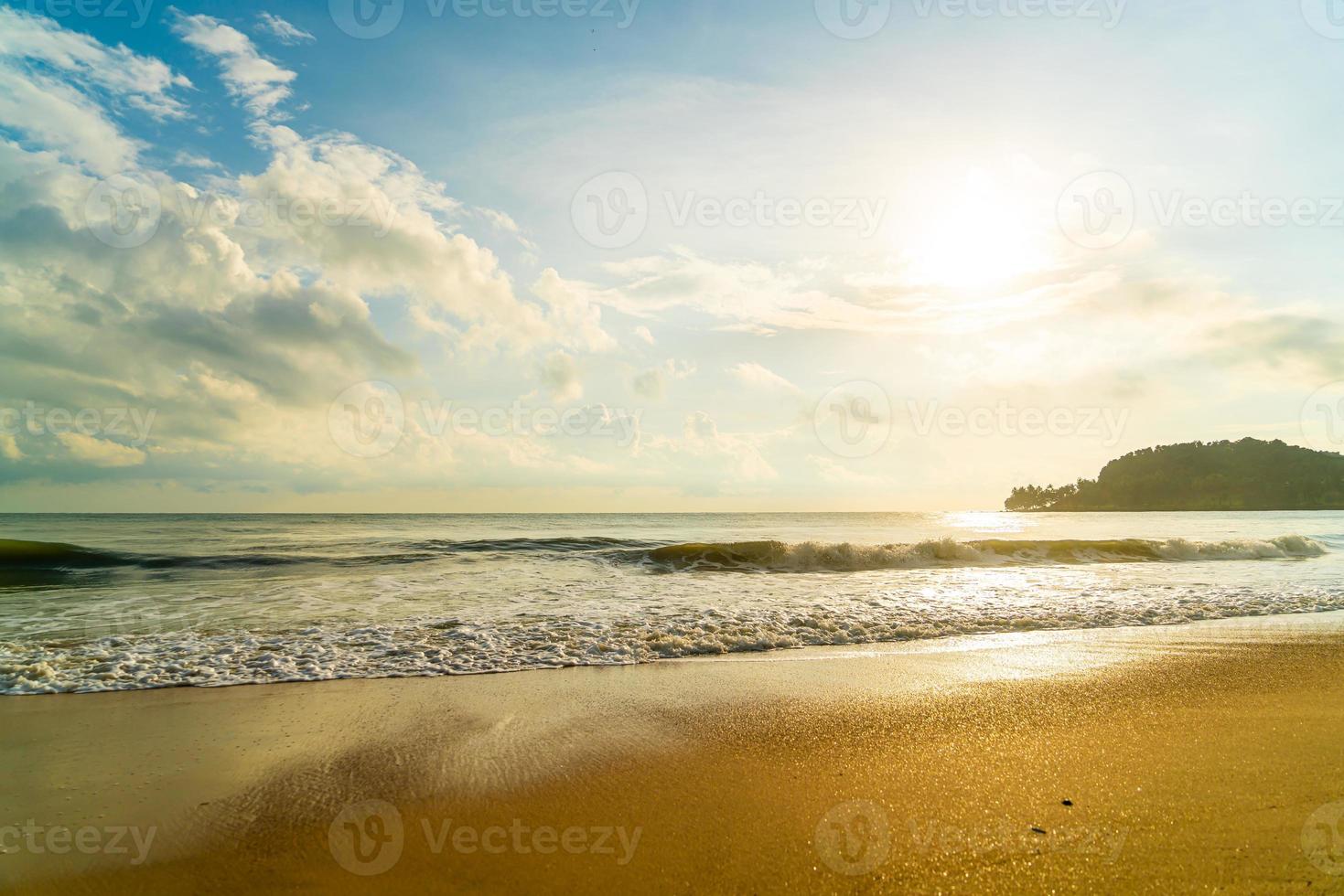 beautiful beach sea at sunrise or sunset time photo