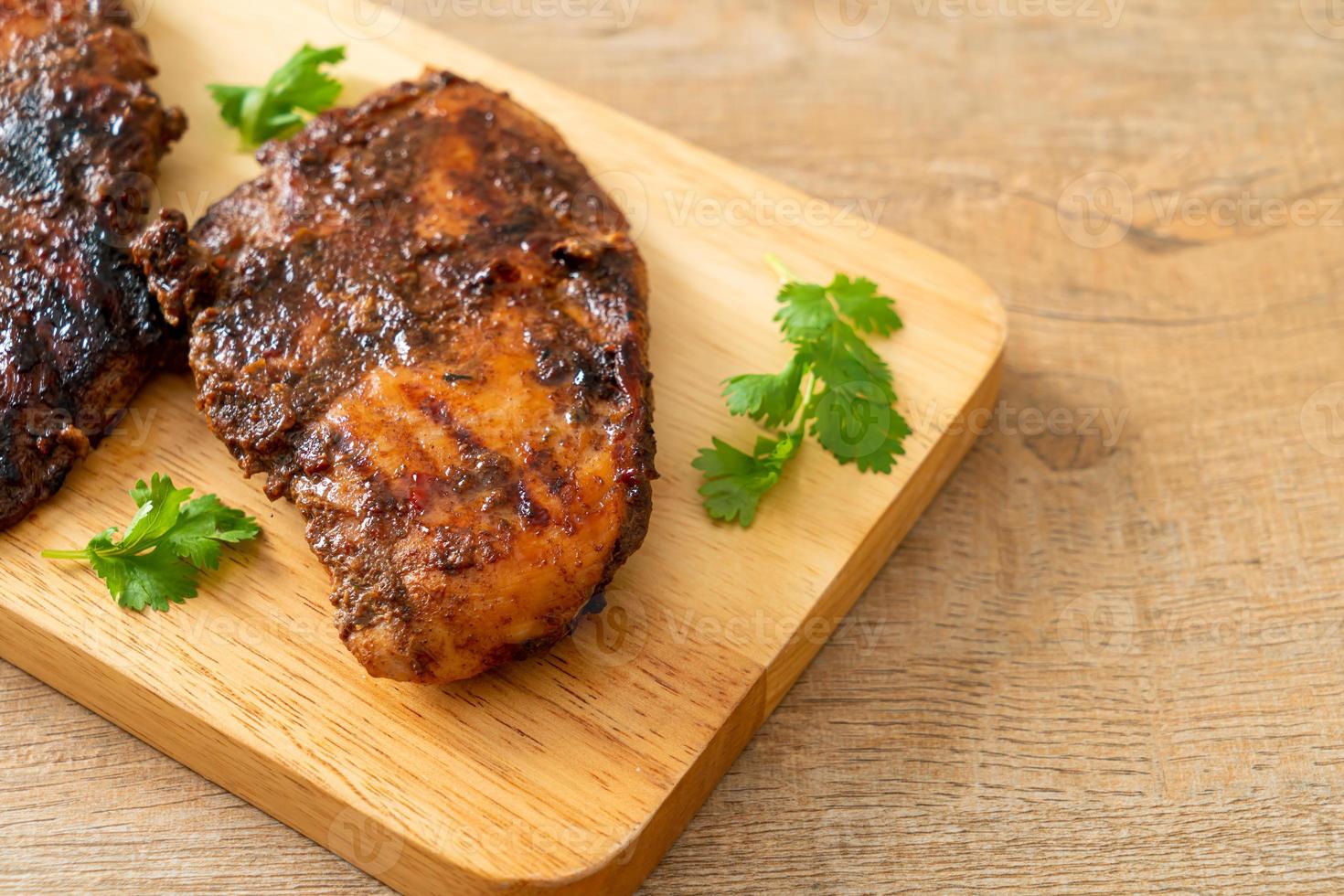 spicy grilled jamaican jerk chicken photo