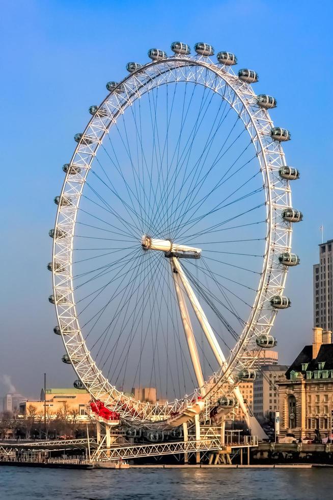 London, UK, 2007. View across the River Thames to the London Eye photo