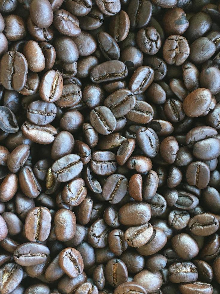 Organic asian coffee bean on wicker basket. photo