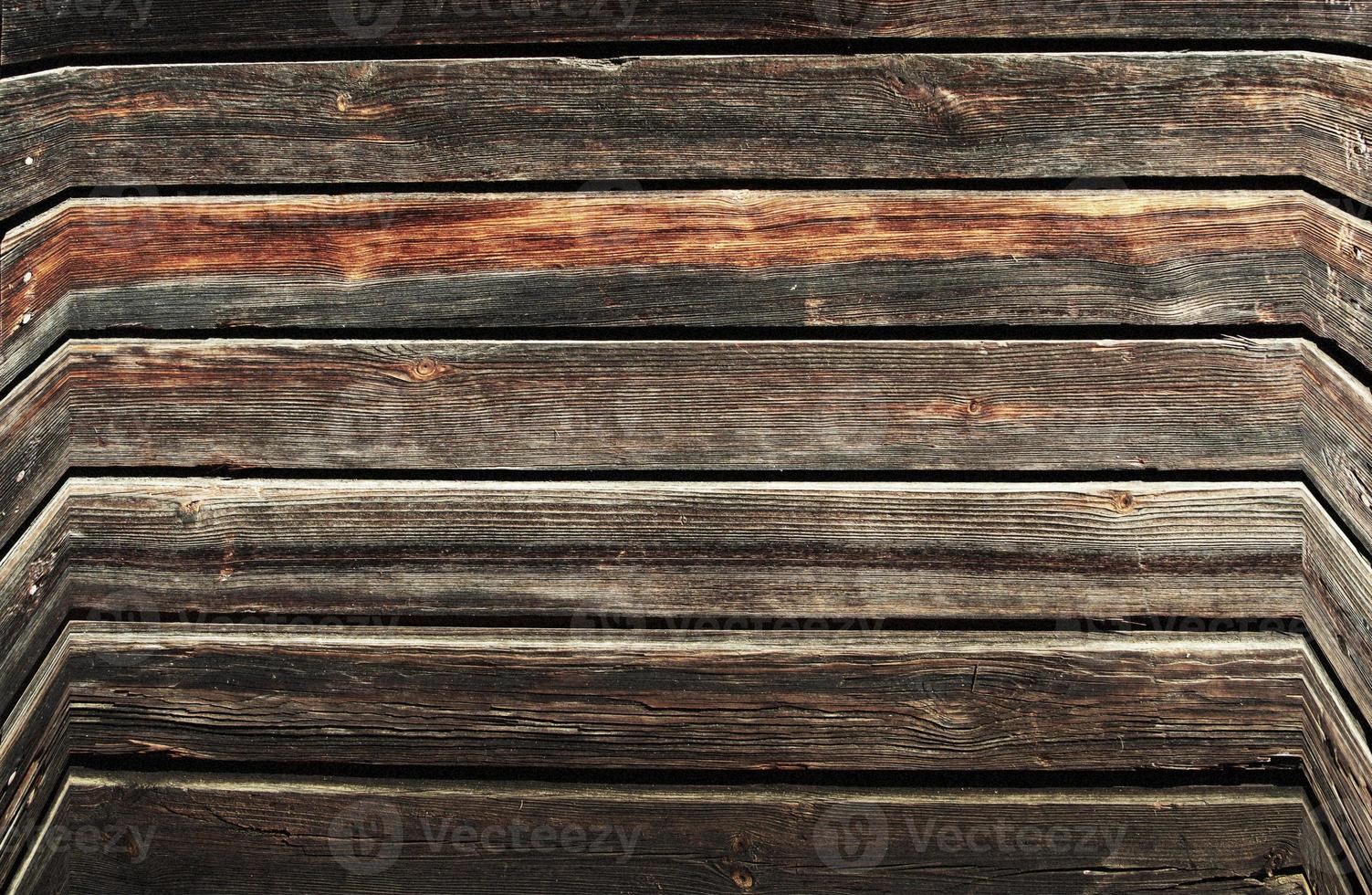 La pared de madera de granero marrón. Patrón de fondo de textura de pared. foto