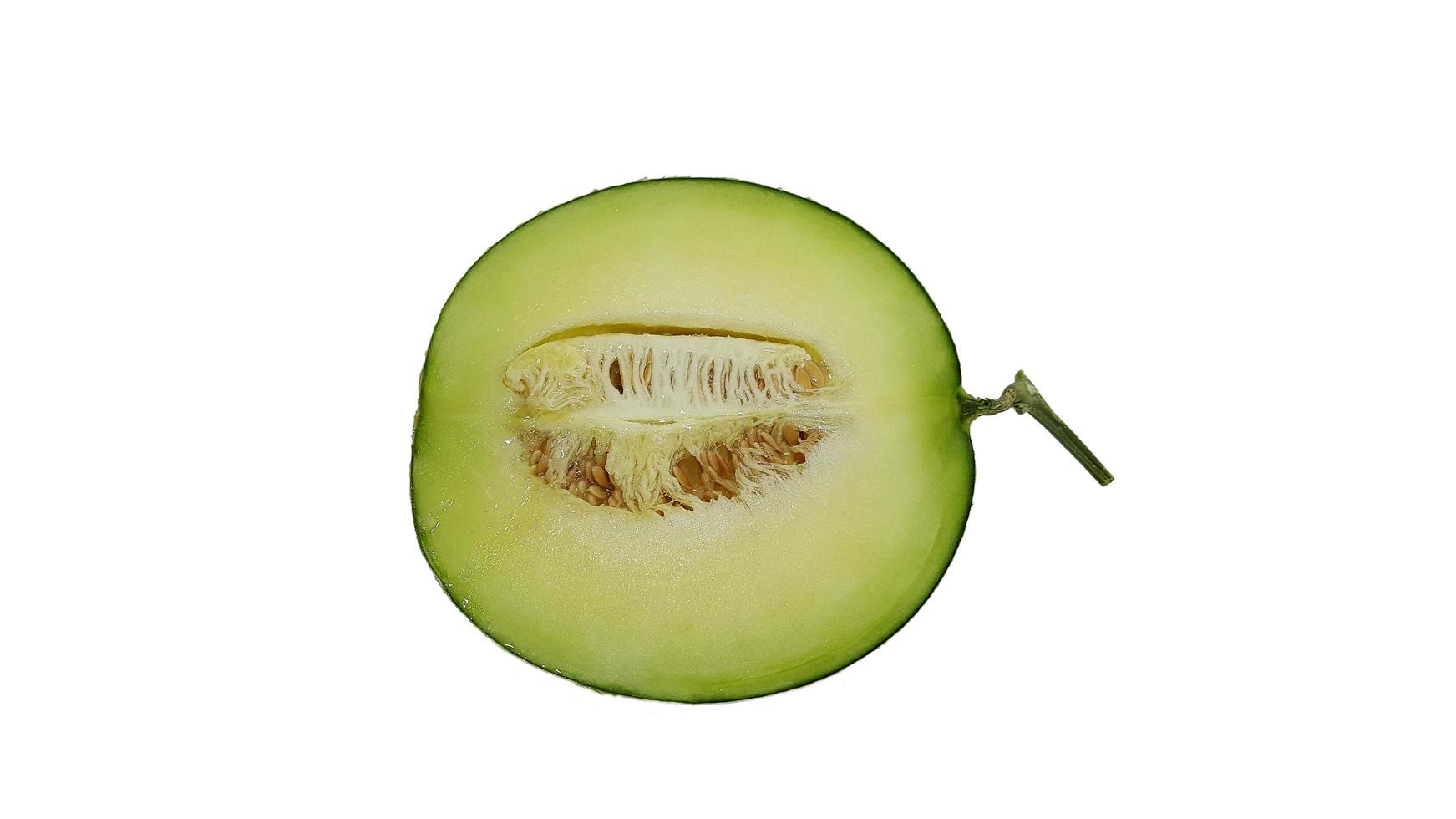 The green melon isolated on a white background. photo