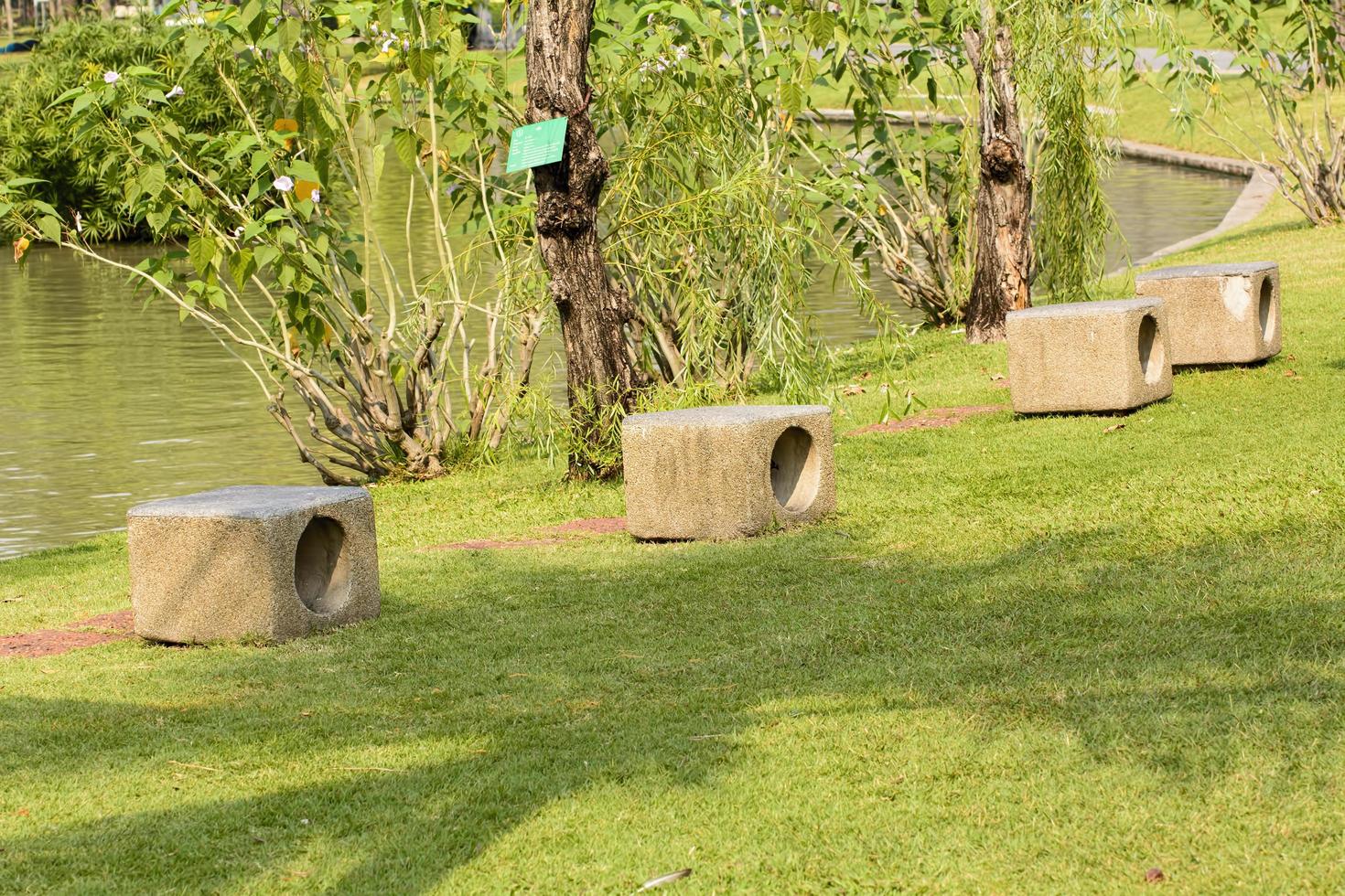 Rock chairs in garden on a nature background. photo