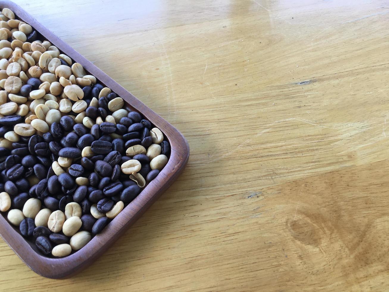 Organic asian coffee bean on wicker basket. photo