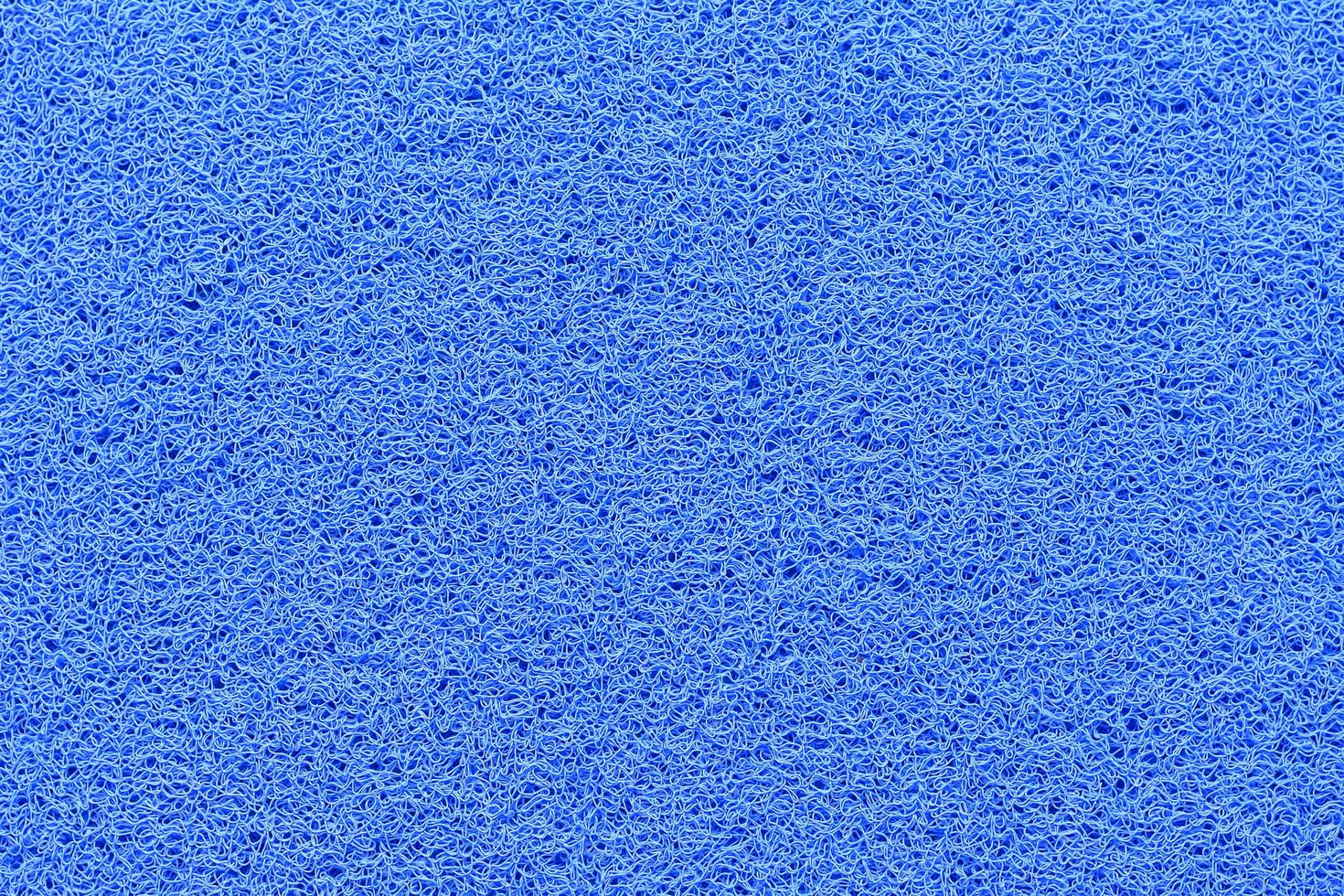 The blue PVC carpet made from plastic. photo