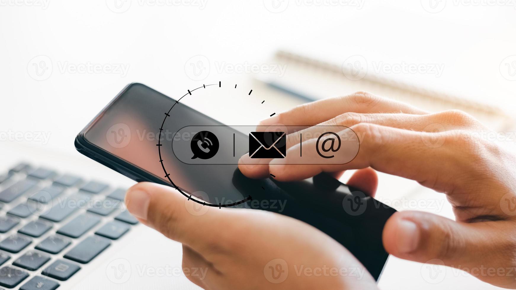 Hand of Businessman hand touching on mobile phone screen. Contact Us, customer support concept, Help Centre. photo