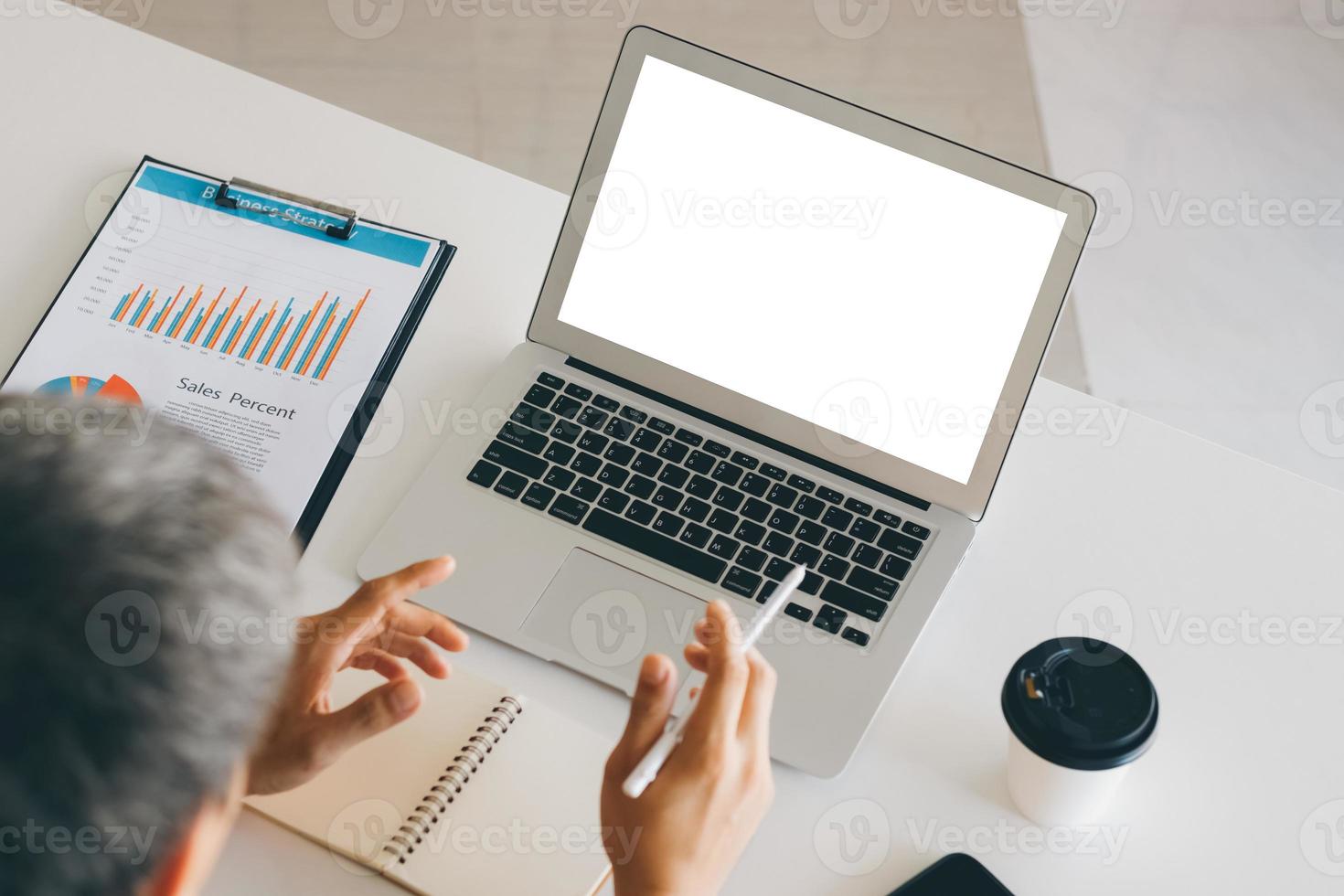 Mockup Copy Space Computer Notebook Laptop Concept , a man's hand using a laptop on internet websites at the office, keyboards on laptop computer with balnk copy screen for your advertising content. photo