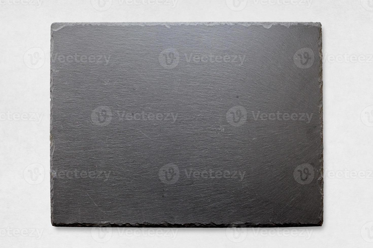 Slate tray on a white surface photo