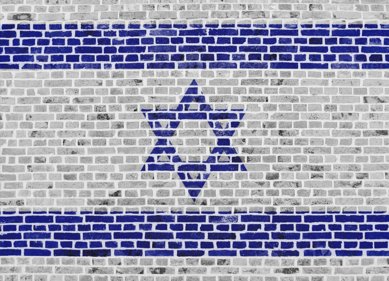 Flag of Israel painted on a brick wall photo
