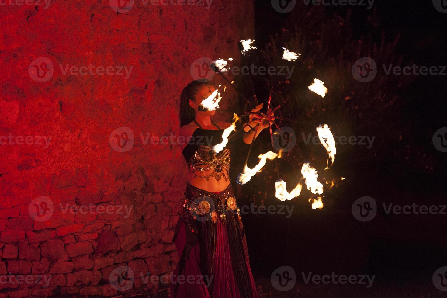 Gypsy girl fire dancing photo