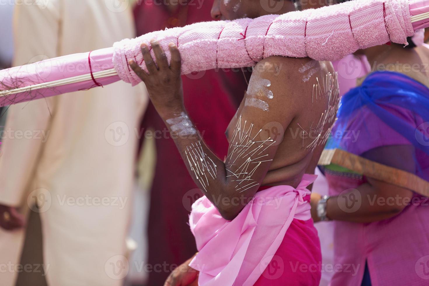 Tamil devotee during a religious procession photo