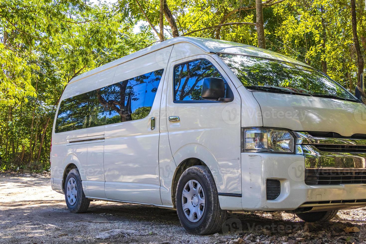 Van car in tropical natural jungle forest Puerto Aventuras Mexico. photo