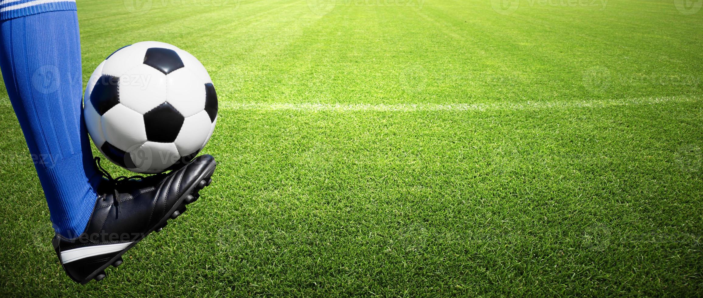 Soccer ball on green playground. Soccer concept photo