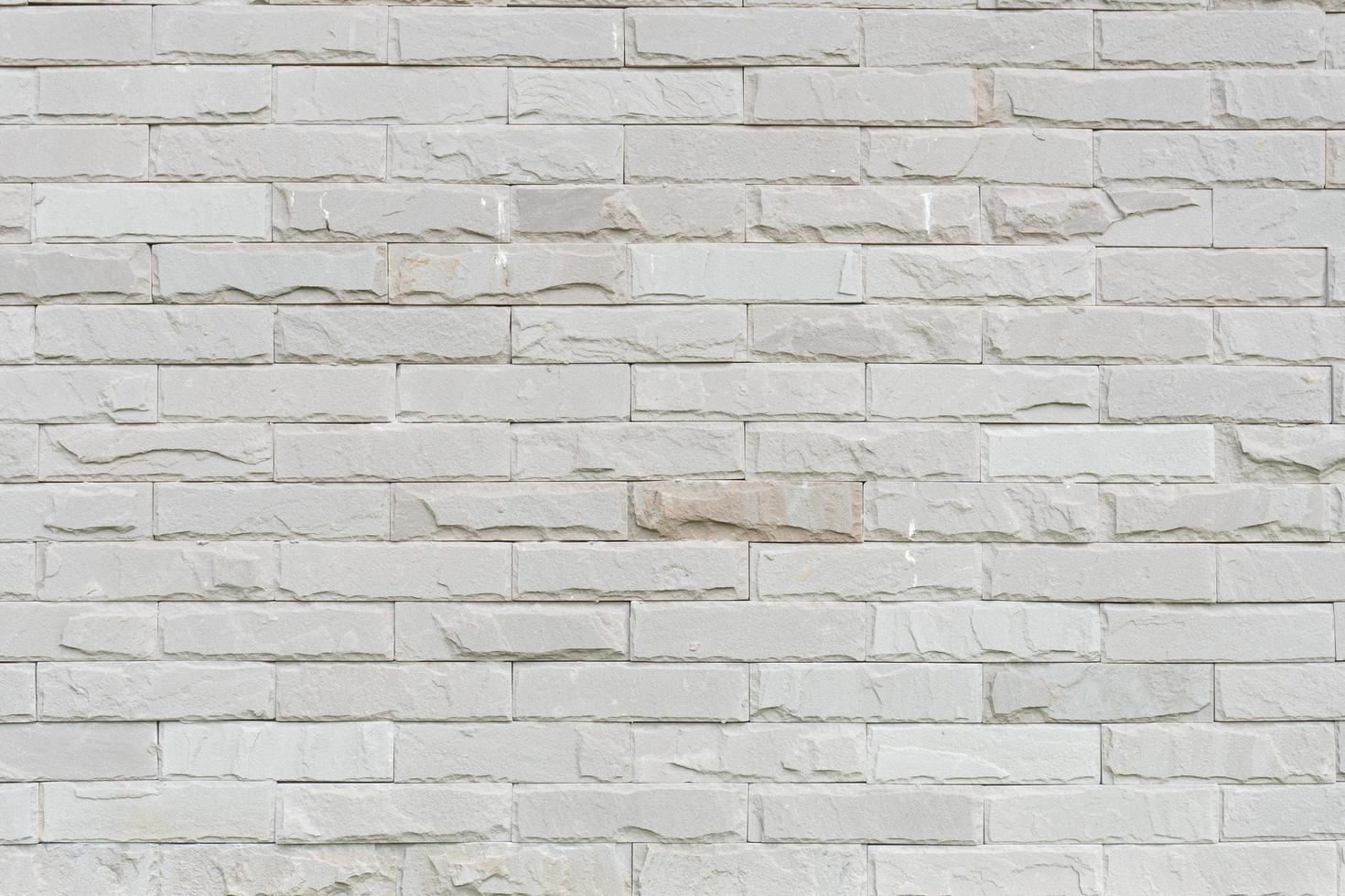 Abstract weathered texture stained old stucco light gray and aged paint white brick wall background photo