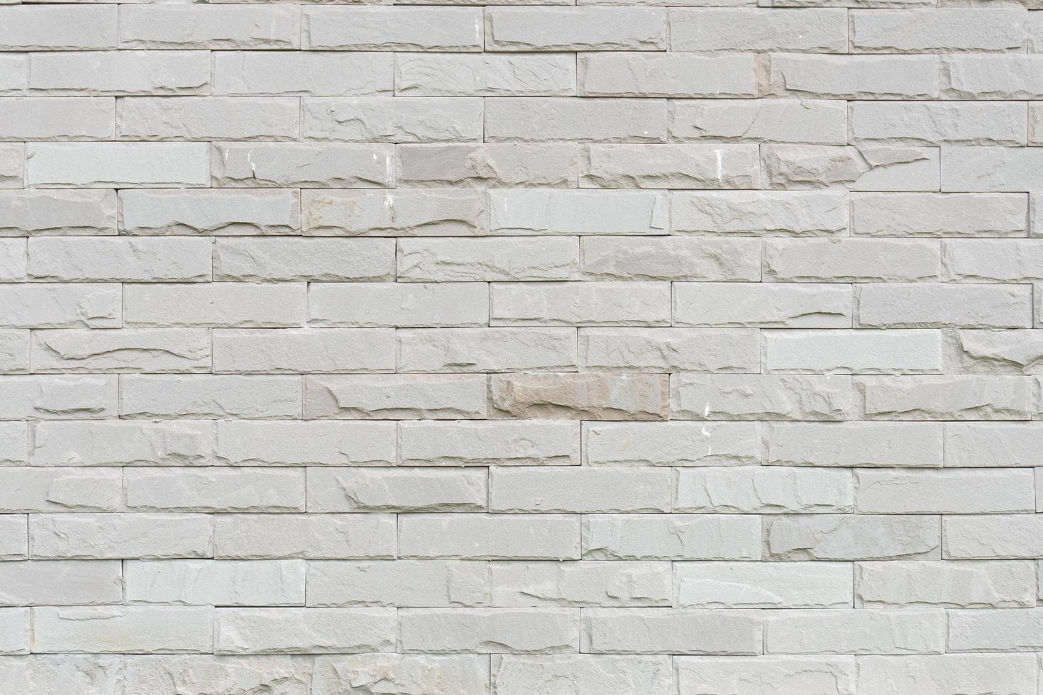 Abstract weathered texture stained old stucco light gray and aged paint white brick wall background photo