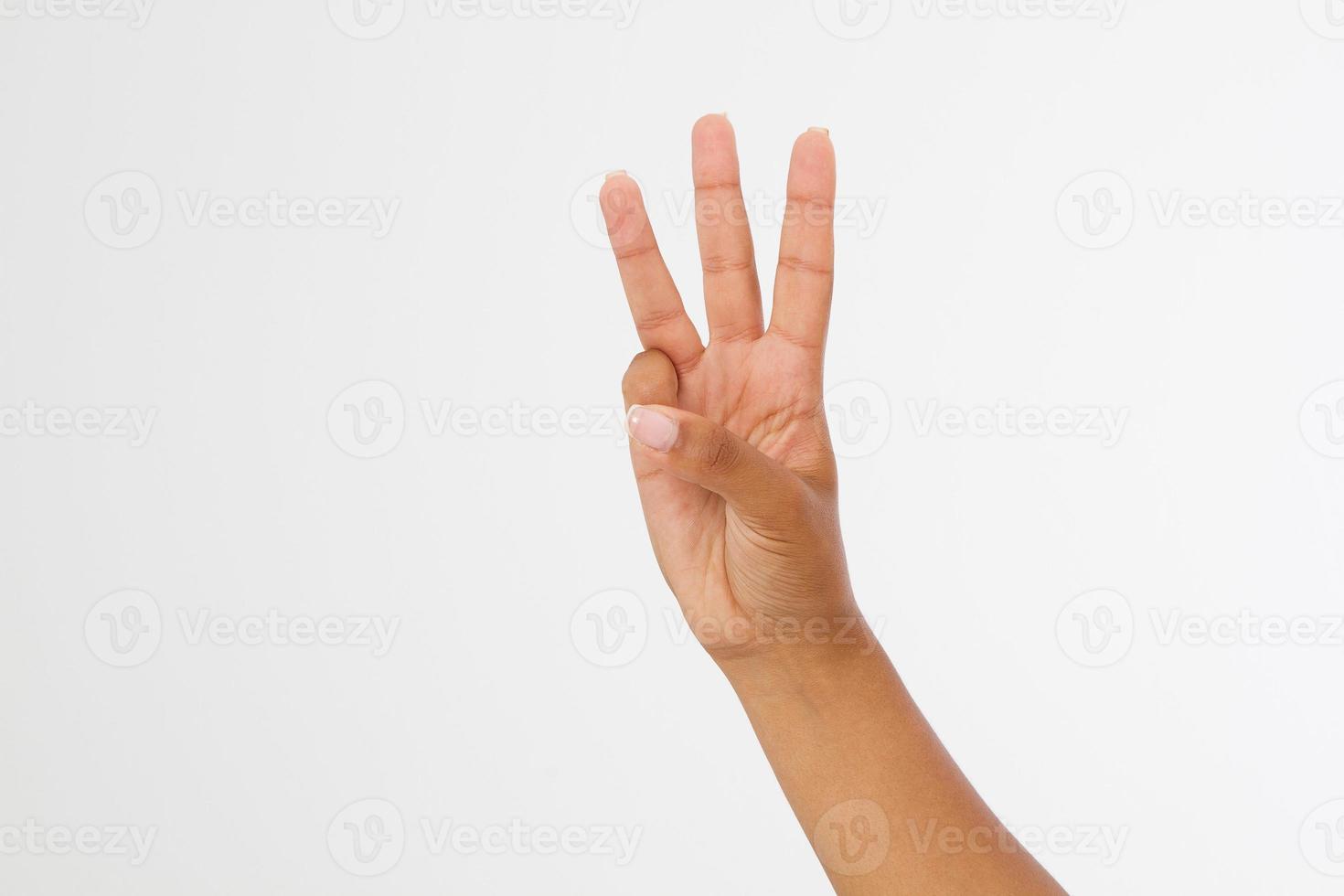 right hand a black woman show the third, number three sign. isolated on white background. afro american hand. Mock up. Copy space. Template. Blank. photo