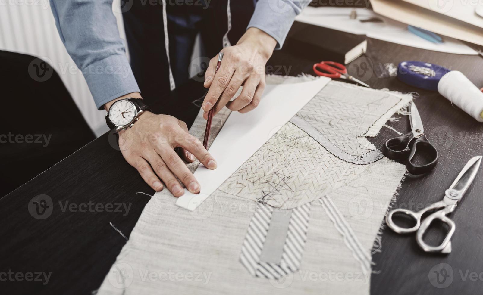 tailor's work table with cloth photo