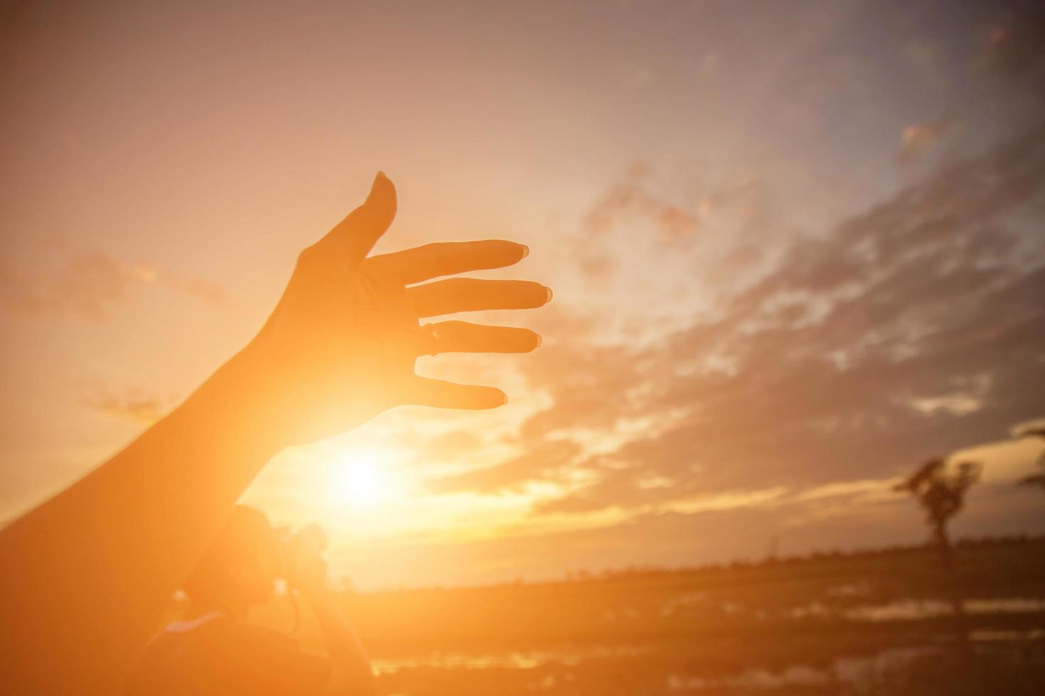 Hands-shape for the Sun. photo