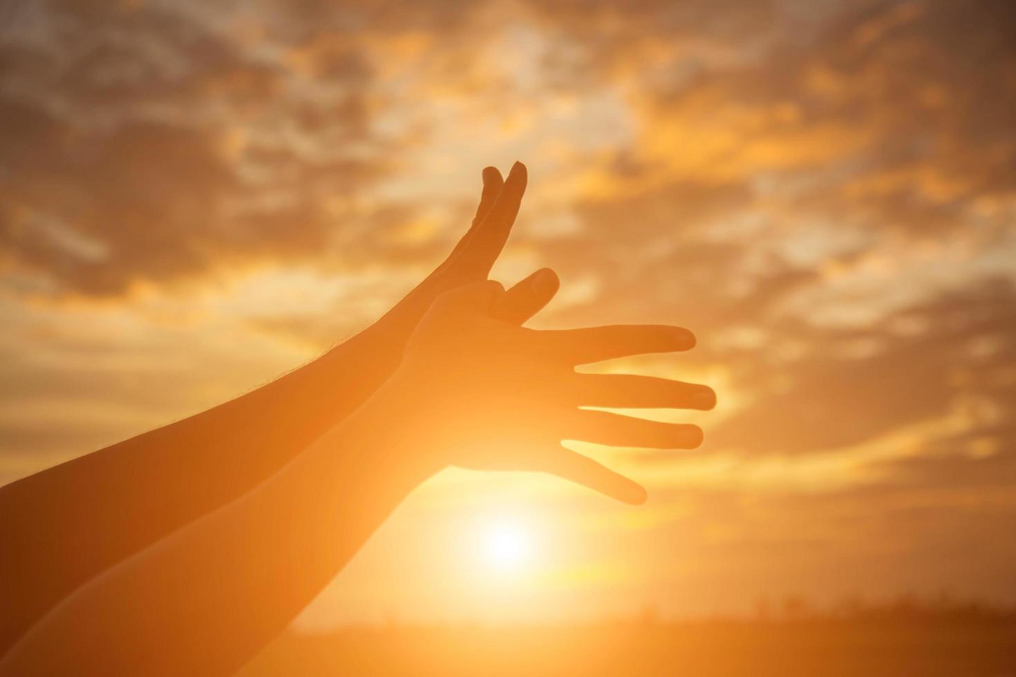 Hands-shape for the Sun. photo