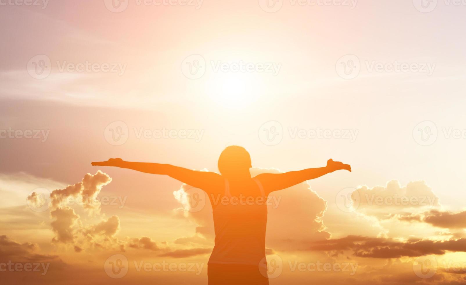 Young woman raise hands up for her success, Concept of Success in life. photo