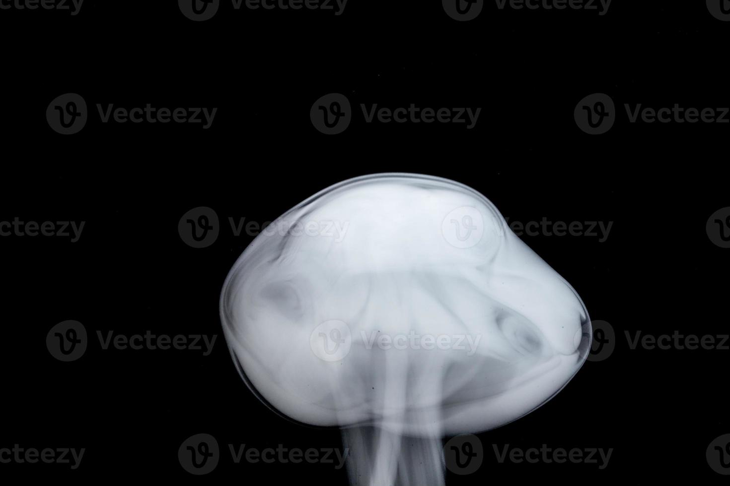 A lonely and curious smoke alien visiting our planet photo