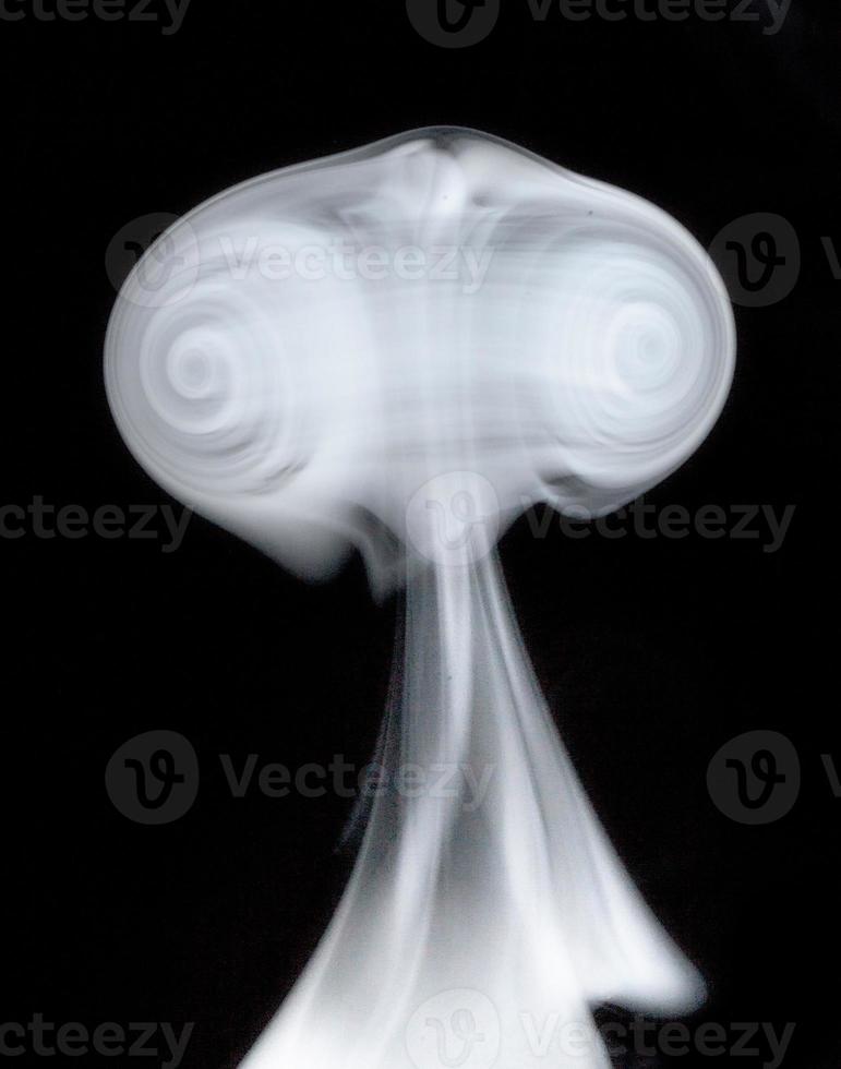 A lonely and curious smoke alien visiting our planet photo