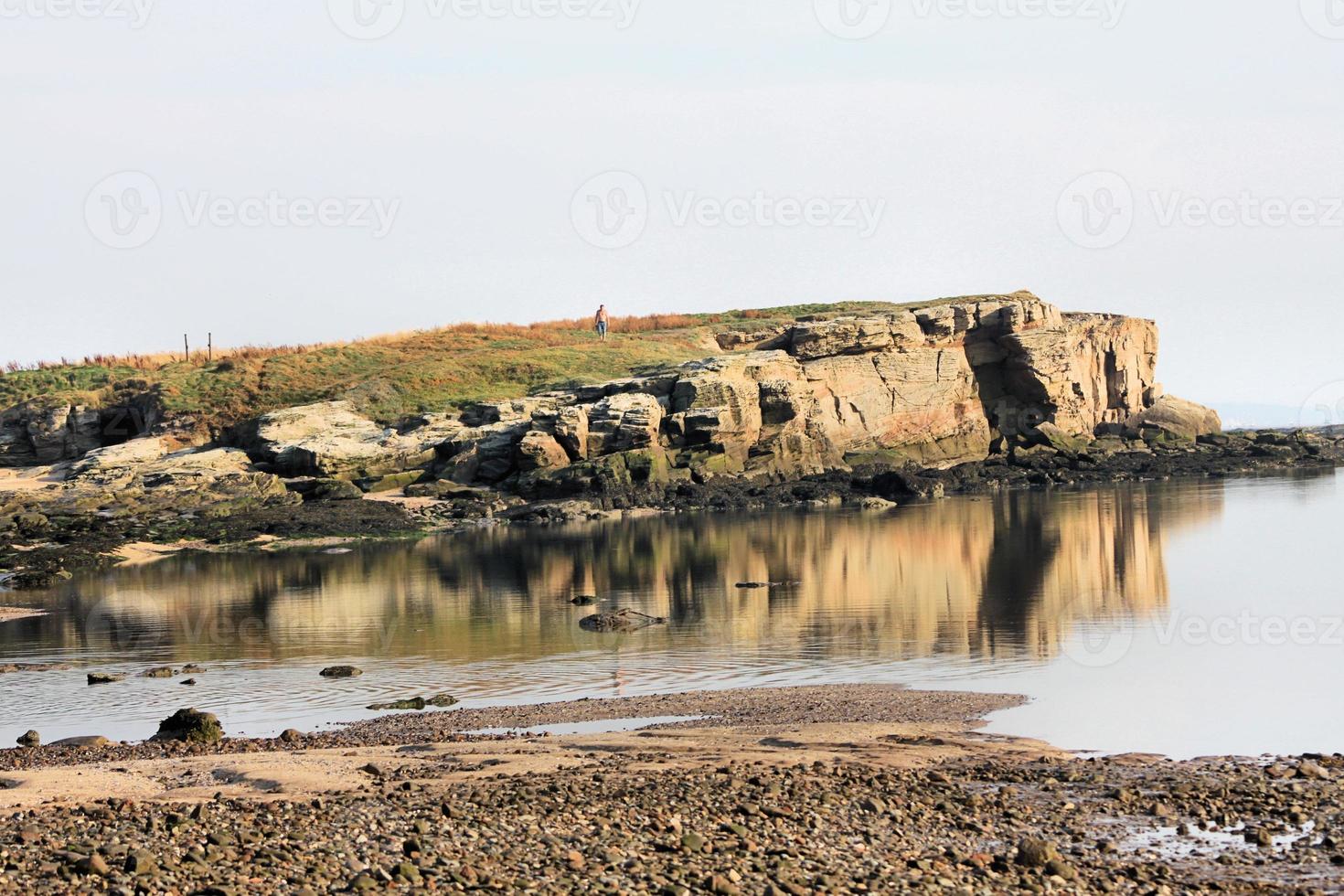 A view of Hilbre Island on the Wirral photo