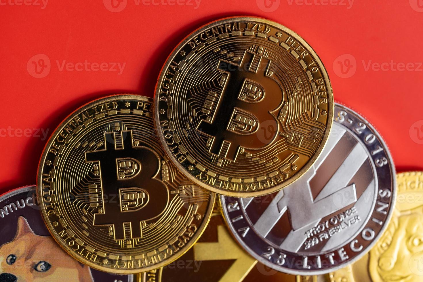 bitcoin BTC and Dogecoin DOGE group included with Cryptocurrency coin , Ethereum ETH, Bitcoin Cash bch, Litecoin LTC symbol Virtual blockchain technology future is money lose Closeup on red background photo