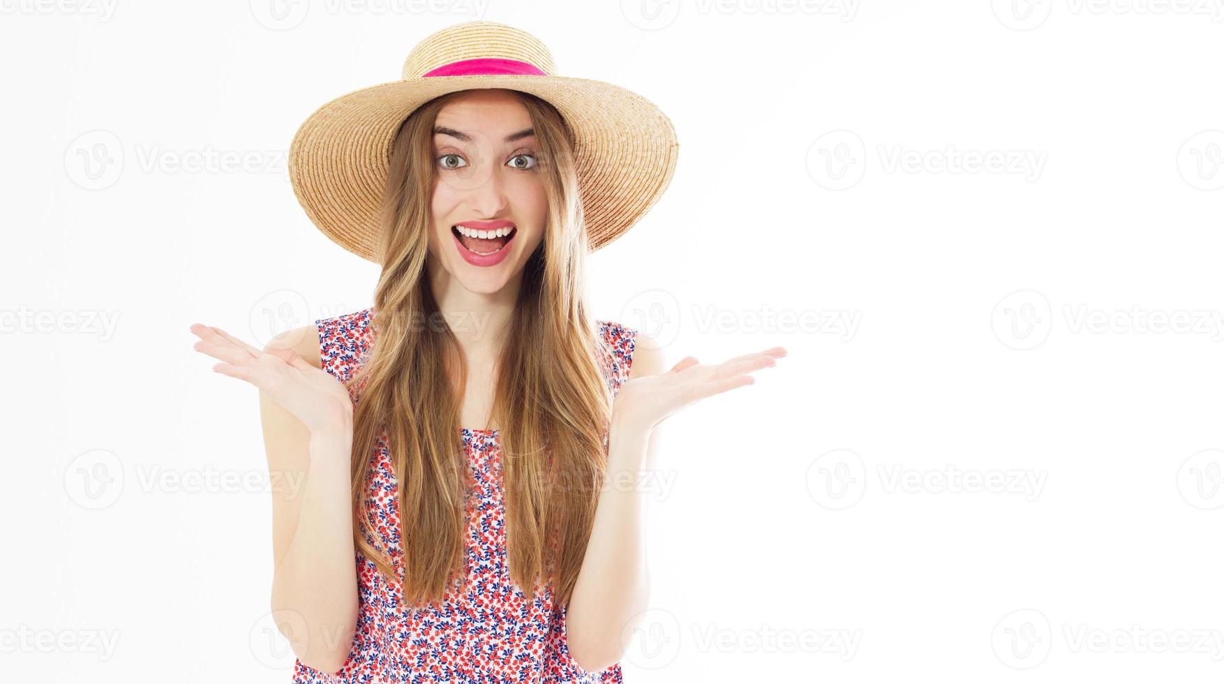 Portrait of a happy cheerful blonde girl in summer hat isolated over white background photo