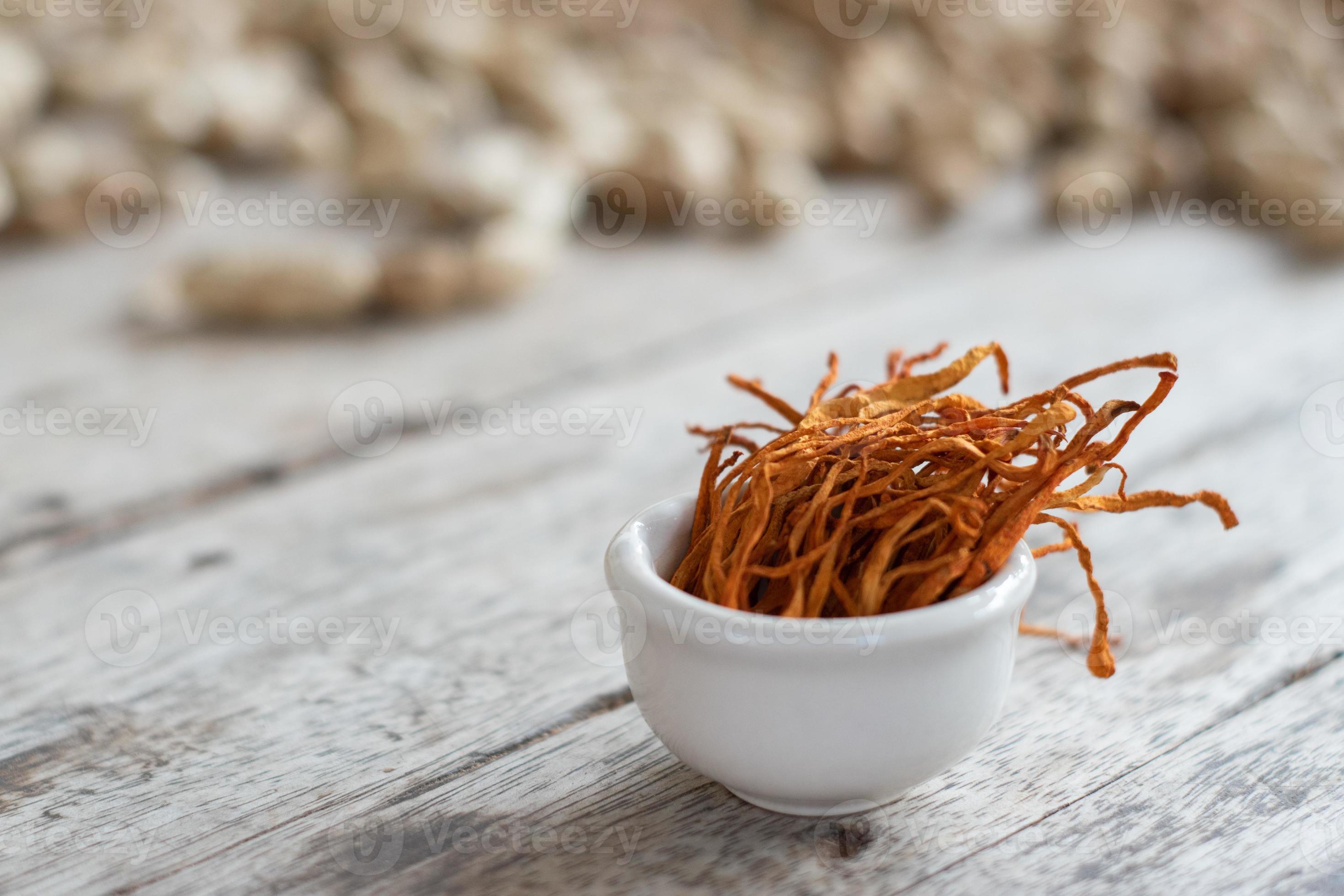 Dry Cordyceps Militaris Mycelium In White Bowl With Wooden Background.  Orange Medical Mushroom For Good Health. 7460021 Stock Photo At Vecteezy