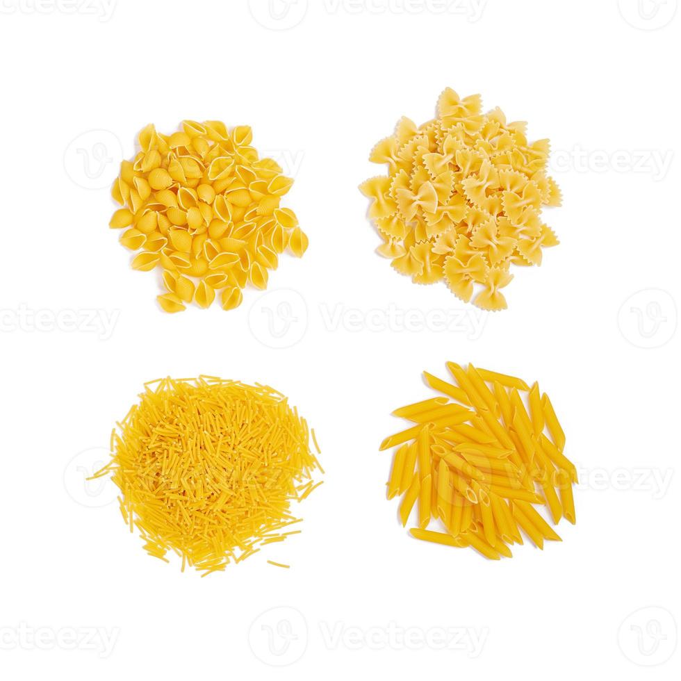 Isolated different pasta on white background. Top view photo