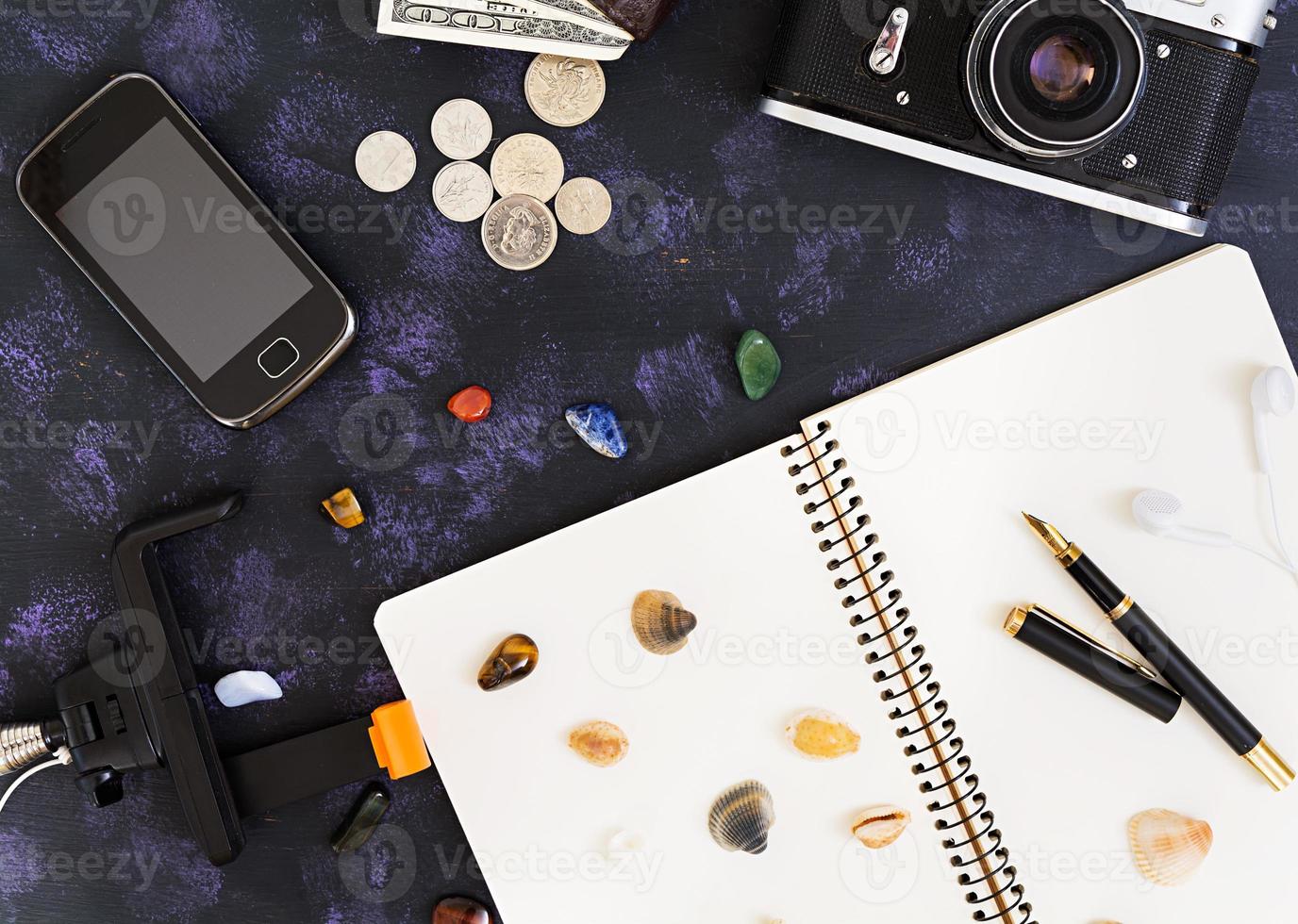 Overhead view of traveler's accessories. Travel concept. Top view photo