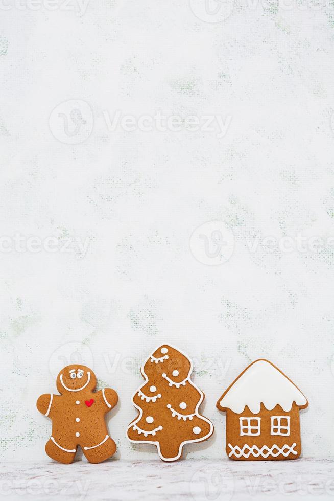 Christmas gingerbread cookies on white background photo