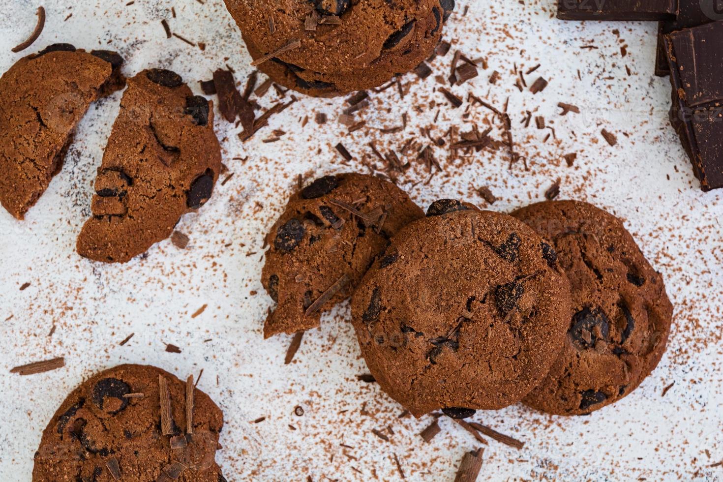 Cookies with chocolate on dark wooden background photo