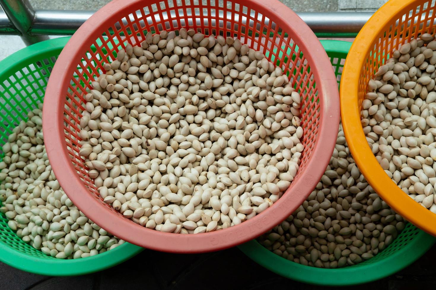 Asian herb Ginkgo biloba, medicinal plants is dried in the basket to prepare for processing into production. photo