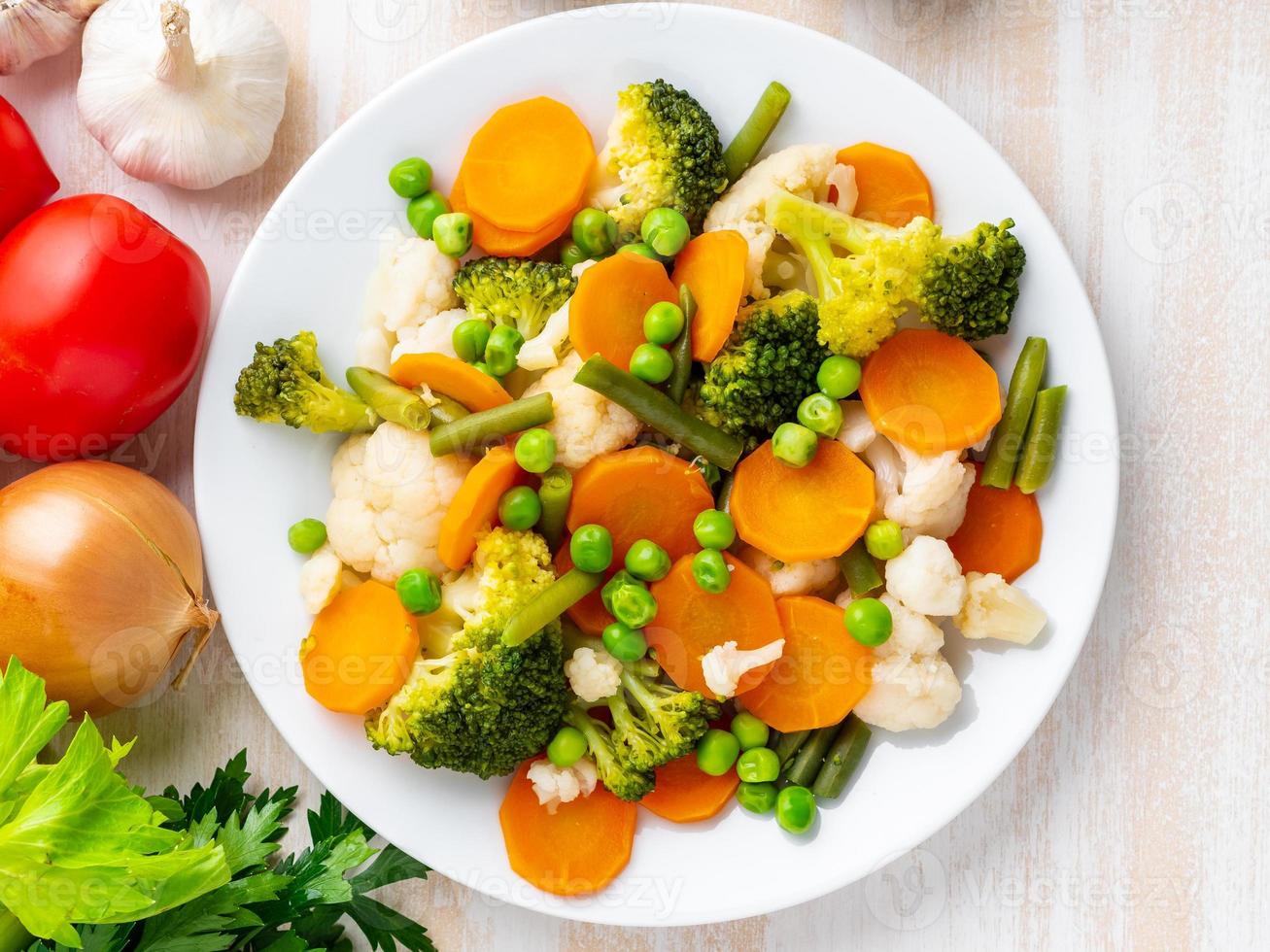 Mix of boiled vegetables, steam vegetables for dietary low-calorie diet photo