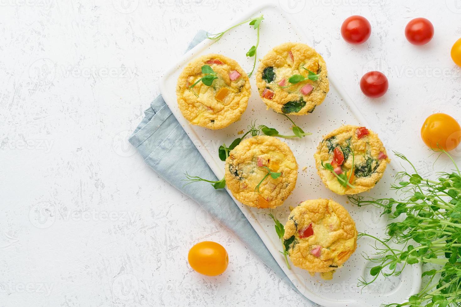 omelet with tomatoes and bacon, baked eggs with spinach and broccoli, keto, ketogenic diet photo
