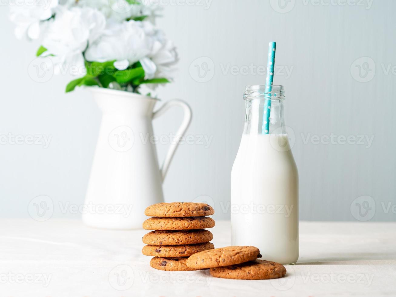 Chocolate oatmeal cookies and milk photo