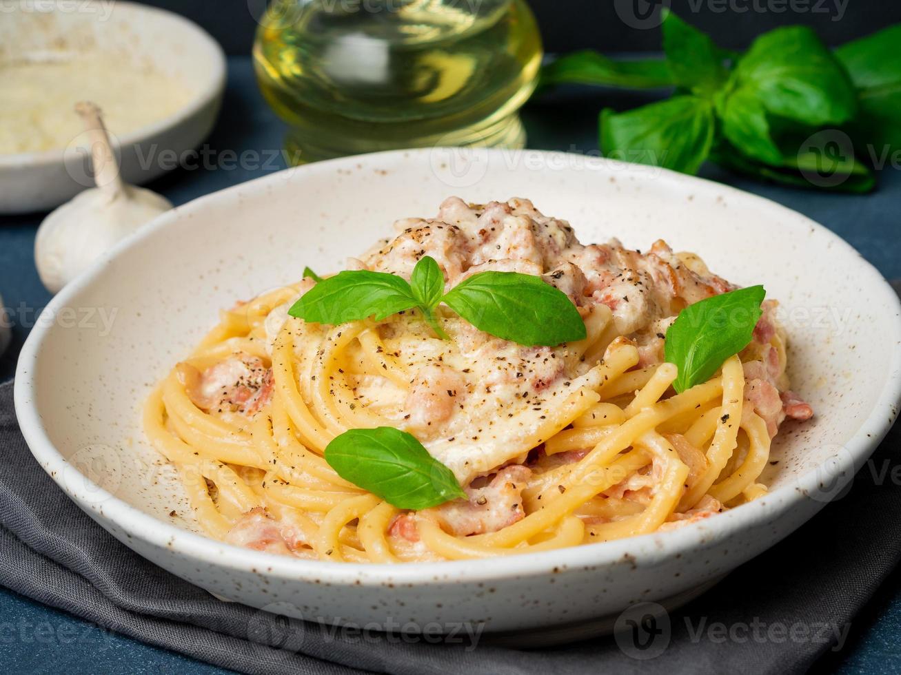 Carbonara pasta. Spaghetti with pancetta, egg, parmesan cheese photo