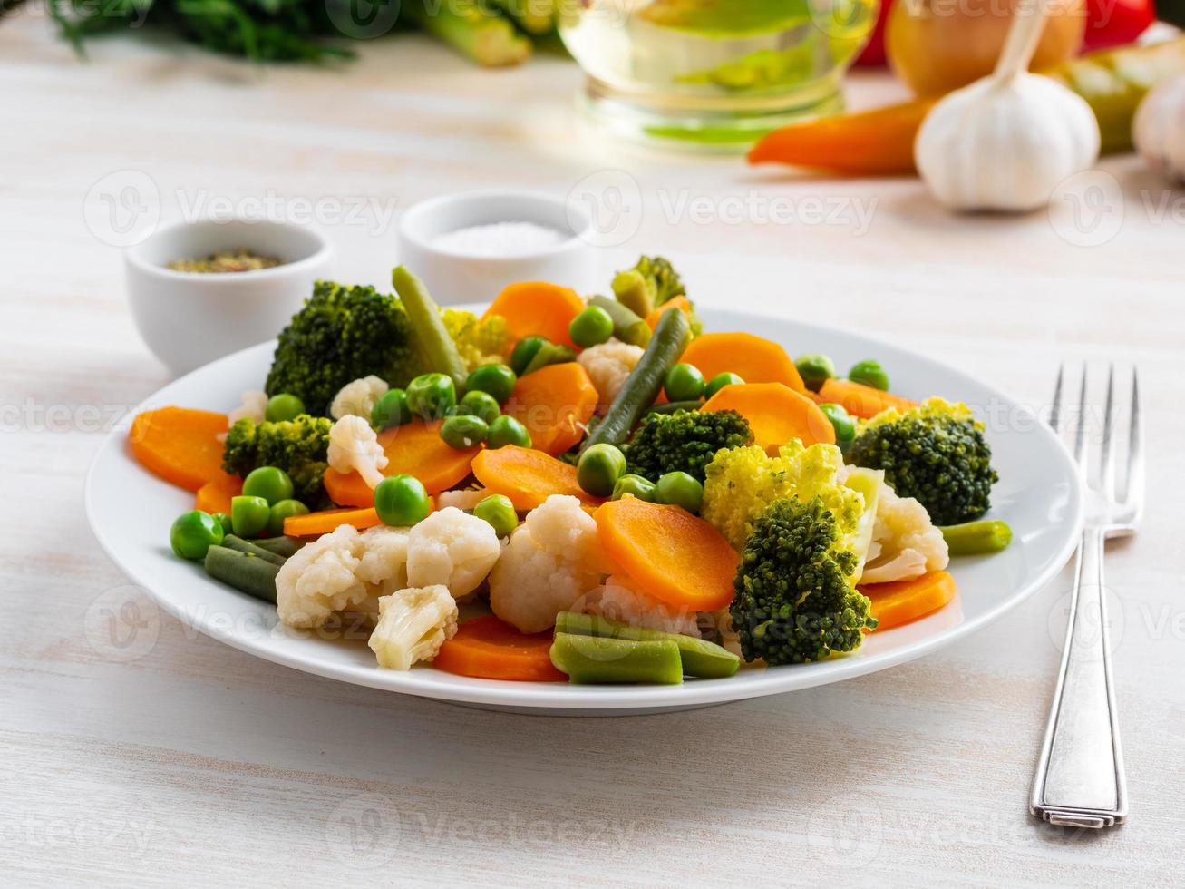 Mix of boiled vegetables, steam vegetables for dietary low-calorie diet photo