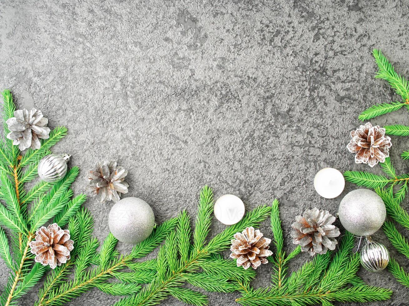 Christmas and Happy New Year gray stone background. Top view, copy space, military stile. photo