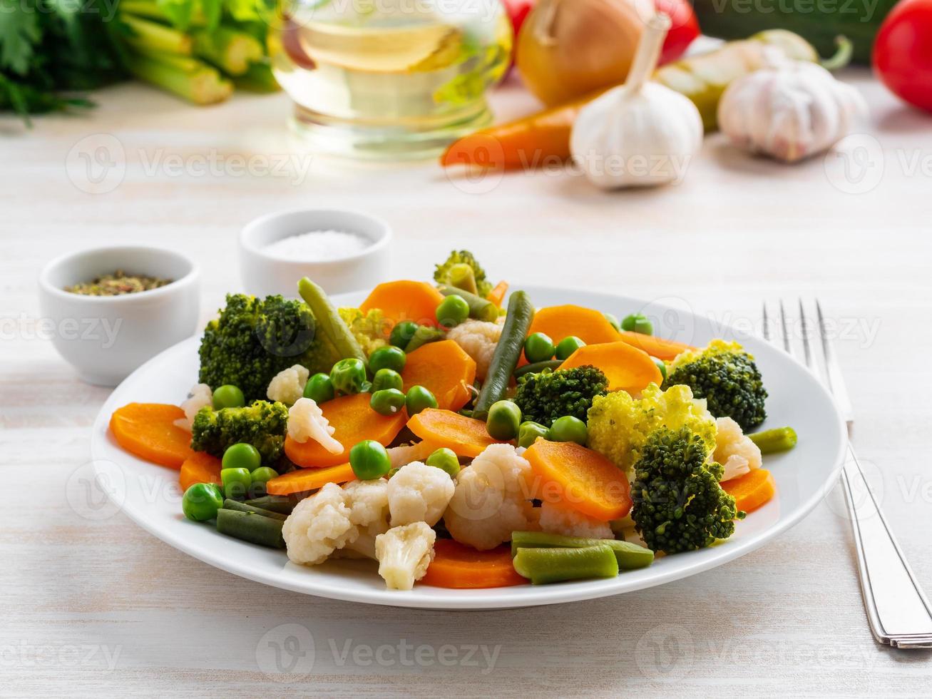 Mix of boiled vegetables, steam vegetables for dietary low-calorie diet photo