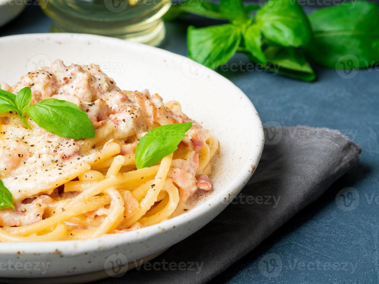 Carbonara pasta. Spaghetti with pancetta, egg, parmesan cheese photo