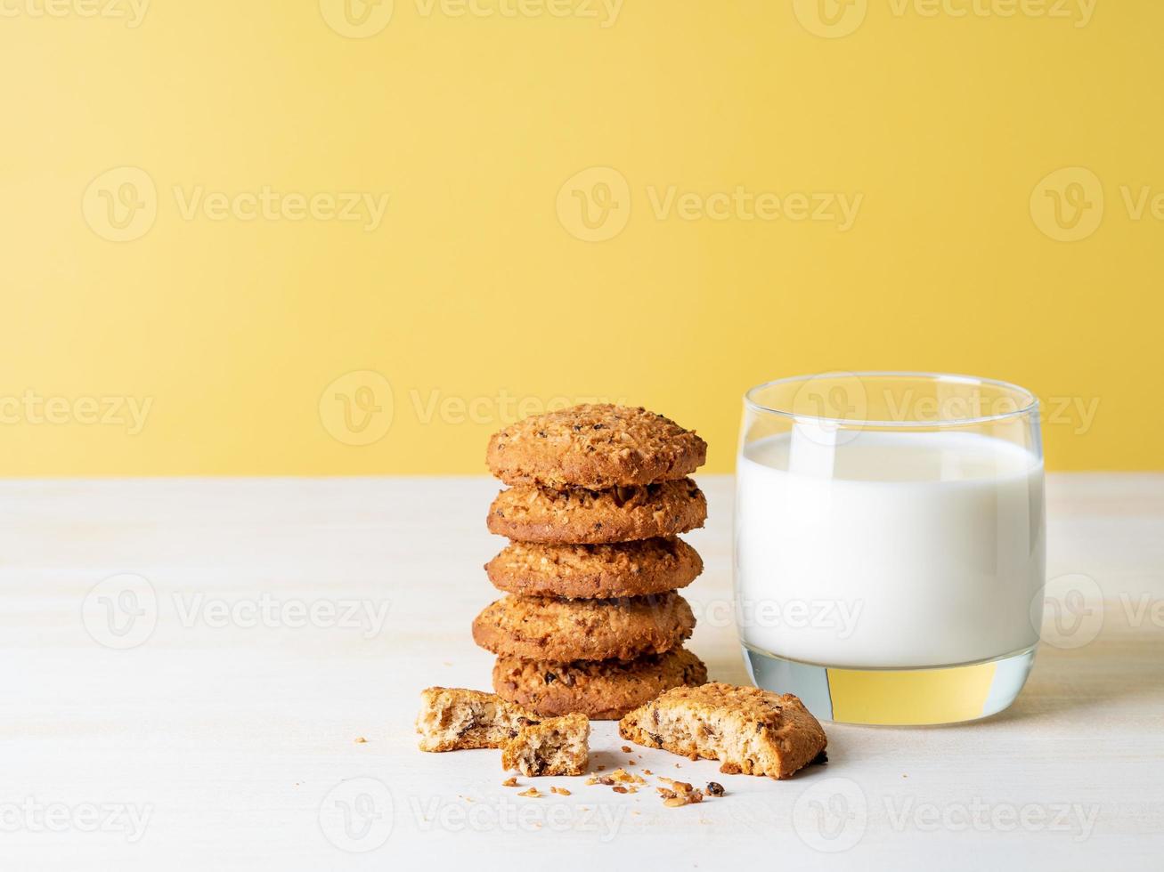 Chocolate oatmeal cookies and milk photo