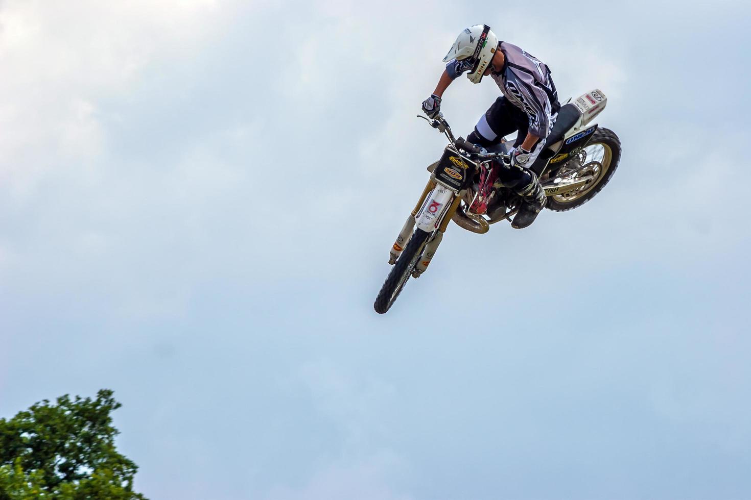 Paddock Wood, Kent, UK, 2005. Stunt Motorcyclist at the Hop Farm photo