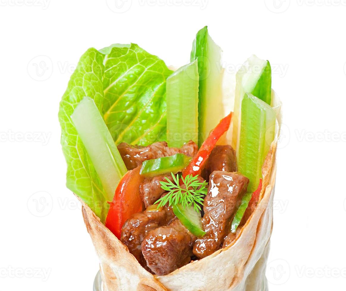 Tortilla wraps with meat and fresh vegetables photo