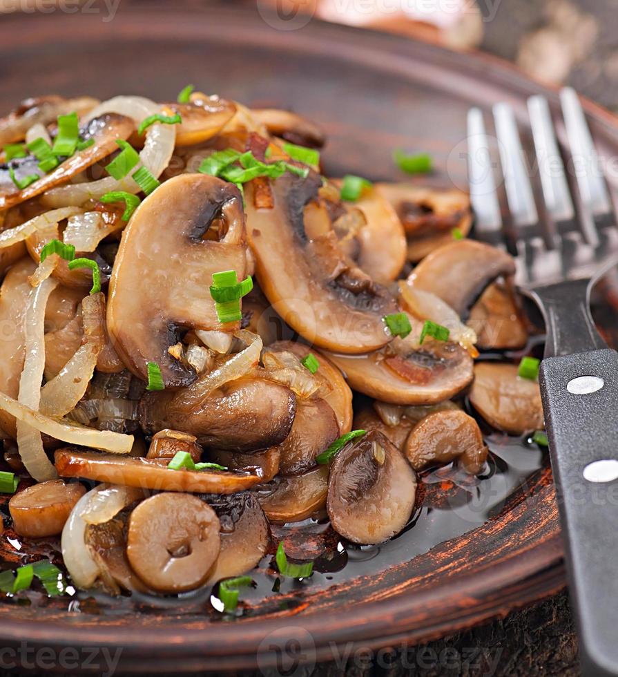Fried mushrooms and onions photo